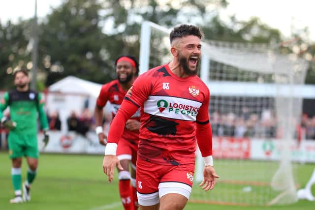 Callum Powell savours the moment after he put the Poppies 2-0 up