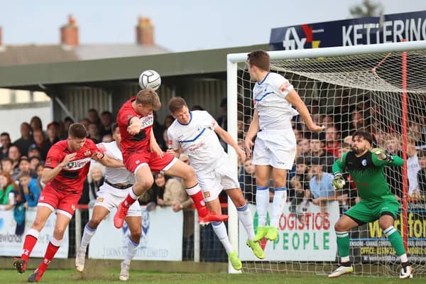 Action from the 2-2 draw between Kettering Town and Buxton at Latimer Park. Picture by Peter Short