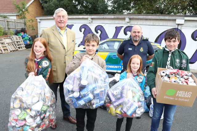 The cans collected need to be crushed to reduce their volume