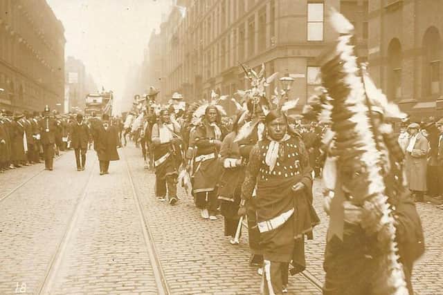 A procession through Portland Street, Manchester, believed to be from the 1903 tour.