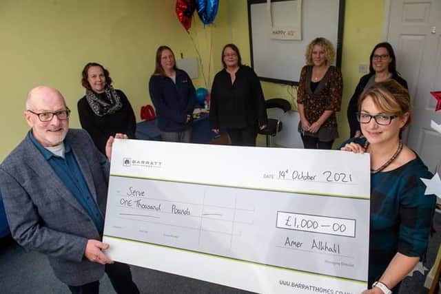 The cheque was presented to SERVE in Rushden