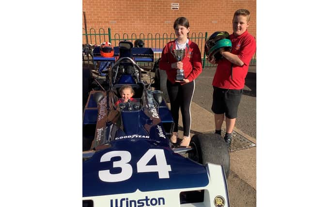 In the pit lane - pupils from St Thomas More during their race day fundraiser