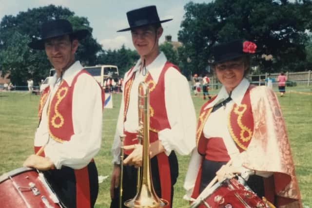 David in the Derby Serenaders with his mum, Shirley Bell, and dad, Brian Bell, on either side