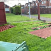 A blown-over fence and wheelie bin in Wellingborough
