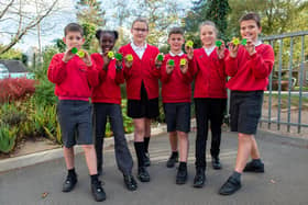 Pupils at Overstone Primary School with their hi-vis bag tags.