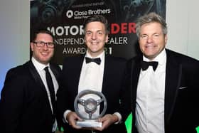 AutoProtect southern zone director Adam Head with Croyland Car Megastore General Manager Mark Swindells (pictured centre) being presented with one of three Motor Trader Independent Dealer Awards at the ceremony with celebrity host Mark Durden-Smith, pictured right.