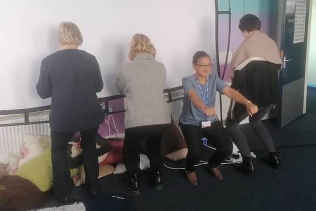 Rajna has been doing sponsored squats with help from her colleagues
