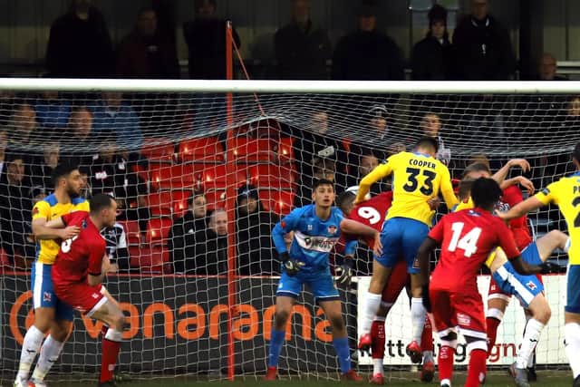 Jake Cooper made amends for his own-goal as he headed Darlington into a 2-1 lead