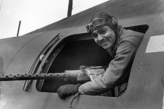 Clark Gable seen at one of the waist gun positions on a B-17 Flying Fortress