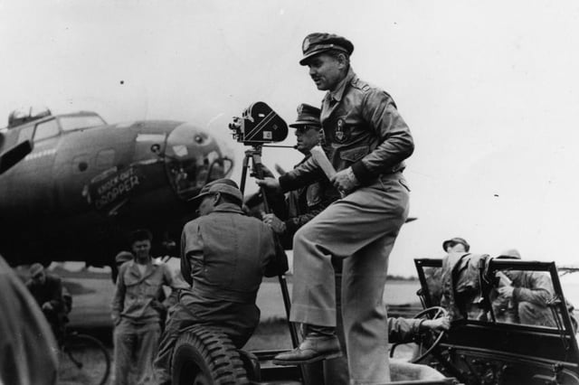 Clark Gable recording the footage needed for his film “Combat America”