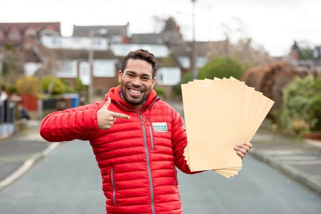 Danyl Johnson with the winners' golden envelopes