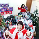 Jeanette Walsh aka Mother Christmas with some of the gifts donated to the annual appeal