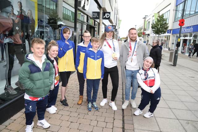 The Paralympians and Olympians with members of Corby Swimming Club