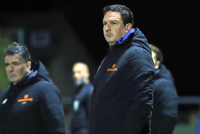 Paul Cox watches on during the NFA Hillier Senior Cup clash