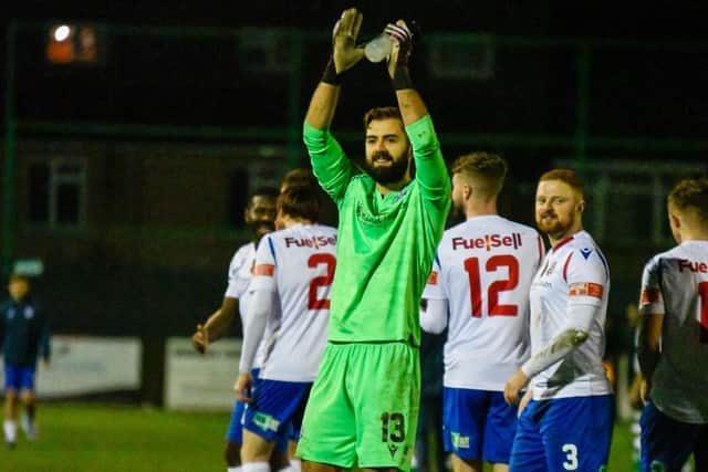 Dean Snedker applauds the AFC Rushden & Diamonds fans after his heroics helped them secure a penalty shoot-out success over Kettering Town in the NFA Hillier Senior Cup. Pictures courtesy of Hawkins Images