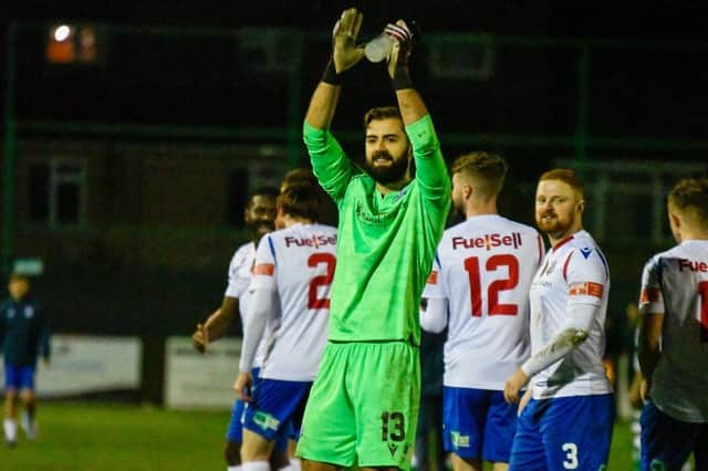 Dean Snedker applauds the AFC Rushden & Diamonds fans after his heroics helped them secure a penalty shoot-out success over Kettering Town in the NFA Hillier Senior Cup. Pictures courtesy of Hawkins Images