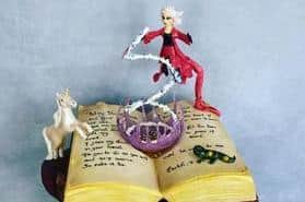 The cake had to feature a standing figure