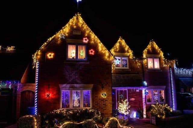 Every house in Hollow Wood Road usually puts up a display. Picture by John Woods.