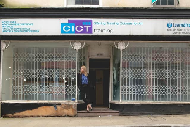 Jannine outside the shop in Wellingborough