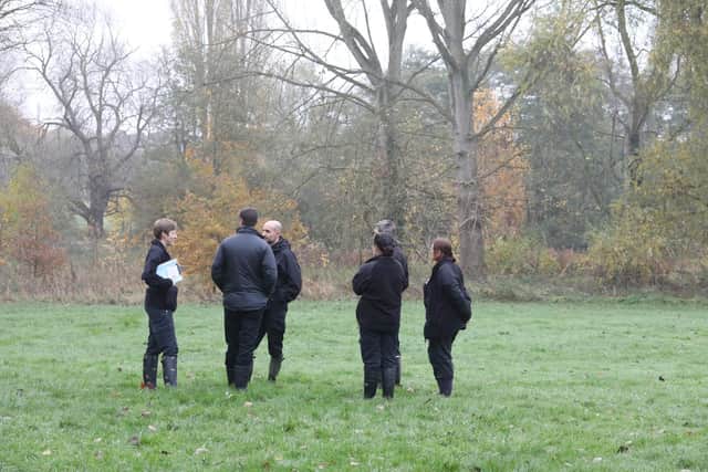 Police discuss the operation this morning.