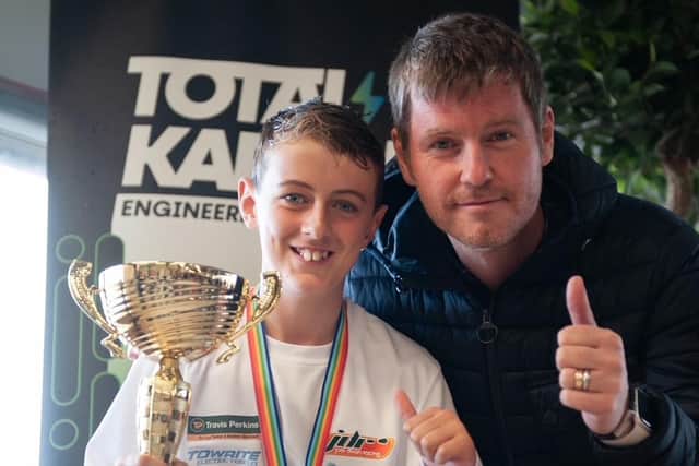 Joel with F1s Rob Smedley after presentation of his championship trophy