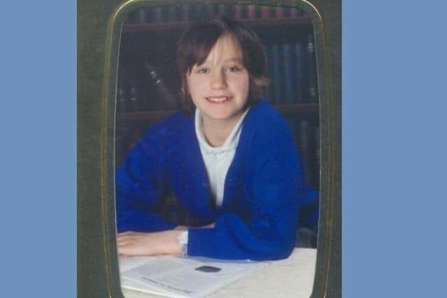 Sarah, pictured as a primary school pupil