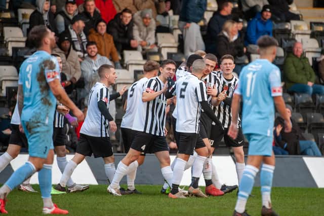 Corby Town celebrate Lewis White's goal during last weekend's 1-1 draw with Cambridge City at Steel Park. Picture by Jim Darrah