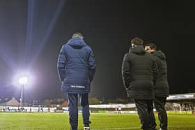 Paul Cox (right) watches on with assistant-manager John Ramshaw (left) and first-team coach Ben Marvin during the 3-1 defeat at Chorley on Tuesday night. Picture by Peter Short
