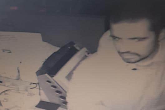 Police issued this photograph of a man they wish to speak to