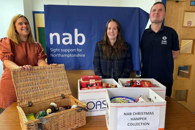 Left to right – Esther Goodger, fundraising and marketing team lead at NAB, Susie Jones of DNG Dove Naish, Hugh Spence, youth and activities support worker at NAB.