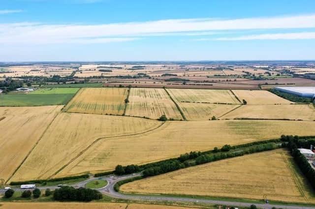 Fields that could see a huge industrial park previously owned by the Church of England's Peterborough Diocese