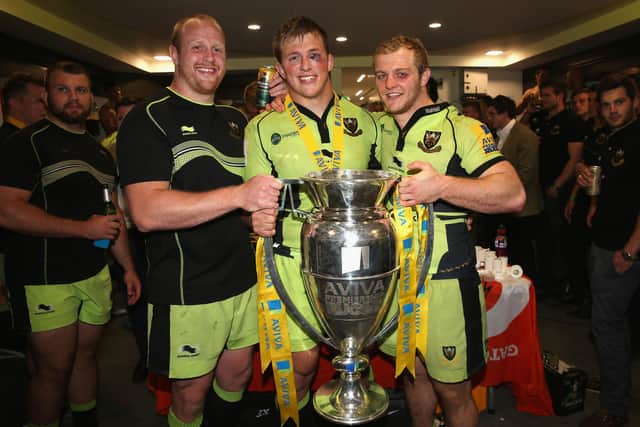 Alex Waller with Ross McMillan (left) and Mike Haywood (right) after Saints won their first and so far only Premiership title back in 2014