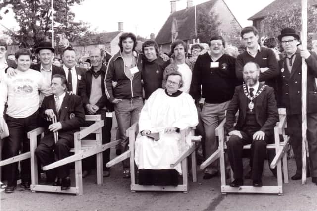 The priest in charge of St John's Church reads the charter at dawn after being carried through the streets on a chair
1982
