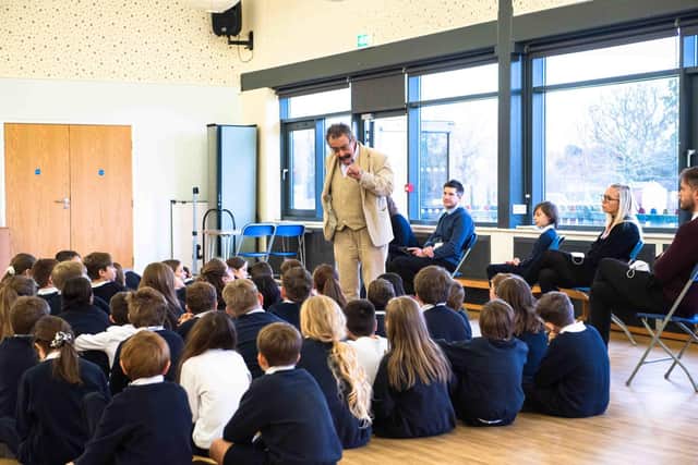 Professor Lord Robert Winston talks to Year 5 students from Oundle CE Primary School and Laxton Junior School