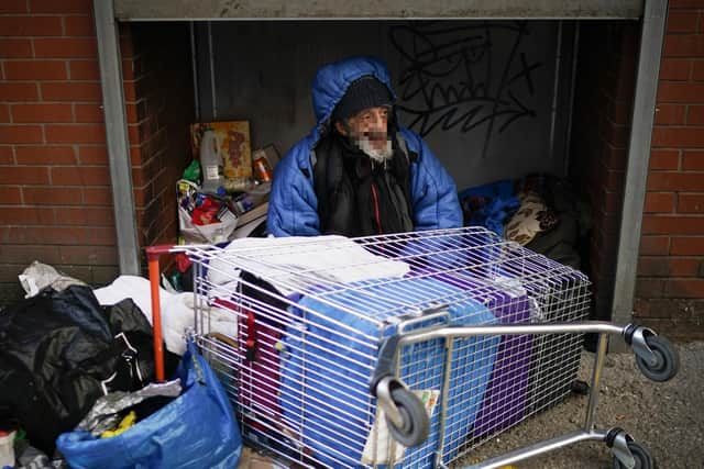 A man sleeping on the streets -