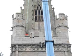 A crane was seen at the church yesterday