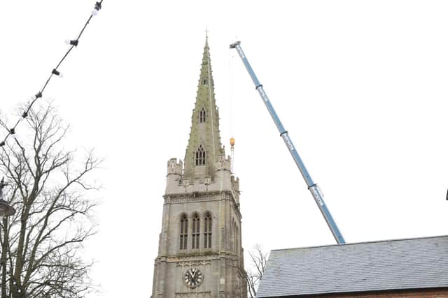 The mast is in the church spire