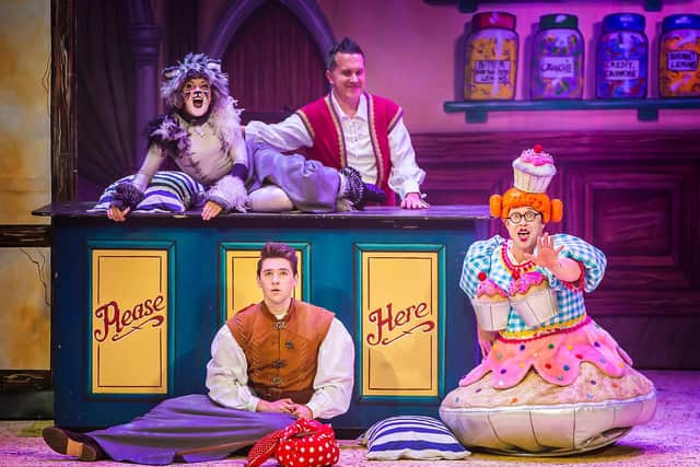 Back row: Jessie Adams as Tommy the Cat, Phil Gallagher as Billy, Front row: Alex Lodge as Dick, Bob Golding as Dame Dolly. Photo: Pamela Raith