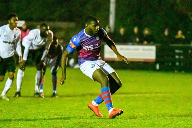 Nathan Tshikuna scores what proved to be the winner from the penalty spot