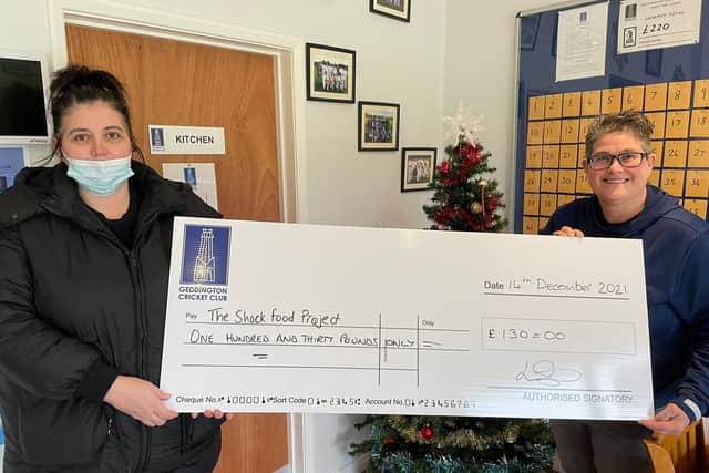 Geddington Cricket Club present the cheque for £130.
