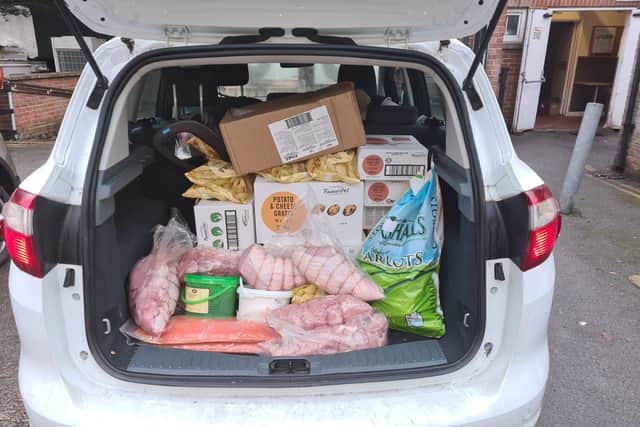 The car-load of food was donated to families in Corby