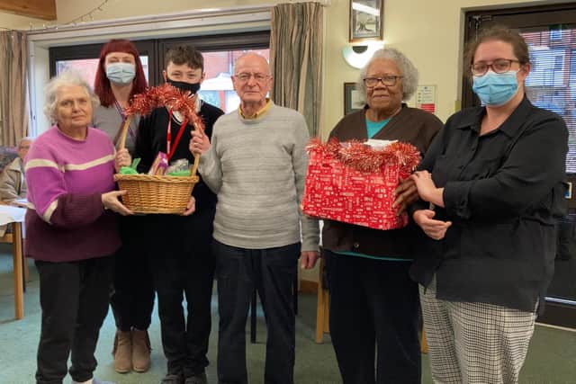 Purple Oaks Academy donating their hampers.