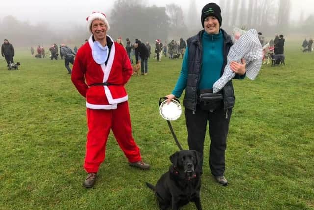 Dog behaviour specialist, Nathan Watson, with Bella's owner, Joanne Knowles, and Bella.