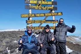L-r Andy, Chris and Pete Mills at the top of Africa's highest peak