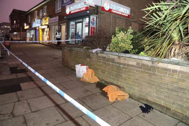 The scene cordoned off by Northants Police in Elizabeth Street, Corby