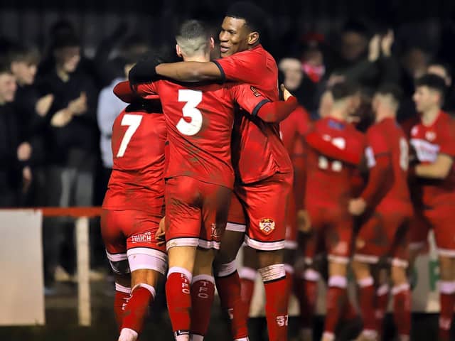 Kettering Town celebrate after George Cooper headed home their third goal in the 3-0 victory over Curzon Ashton. Pictures by Peter Short