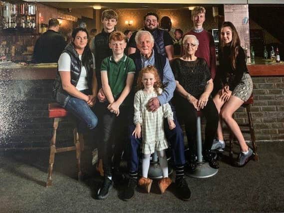 George Davis with his grandchildren and great-grandchildren SUS-220120-093624001