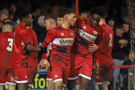 The Kettering Town players celebrate their third goal in last weekend's 3-0 home win over Curzon Ashton. Picture by Peter Short