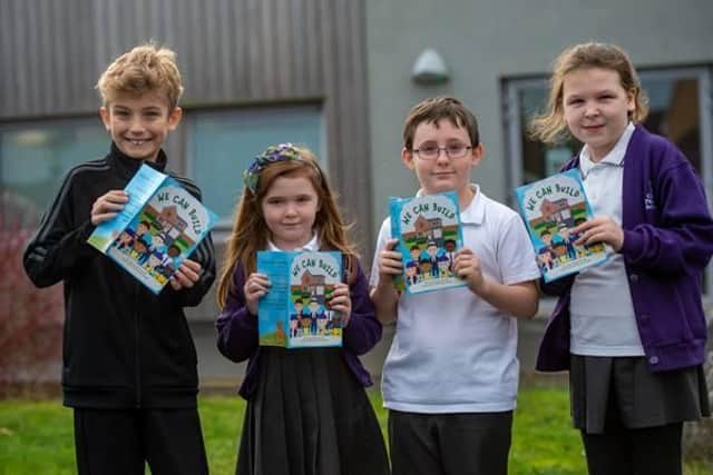 Pupils at Corby Primary Academy have been presented with 65 books for their school library