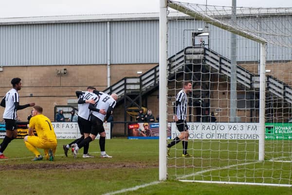 The celebrations begin after Jordan O'Brien opened the scoring in Corby Town's 3-0 success over Coleshill Town at Steel Park. Picture by Jim Darrah